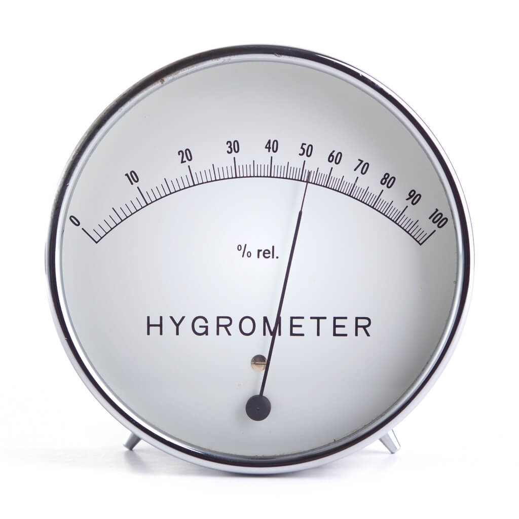 a hygrometer measuring the amount of humidity