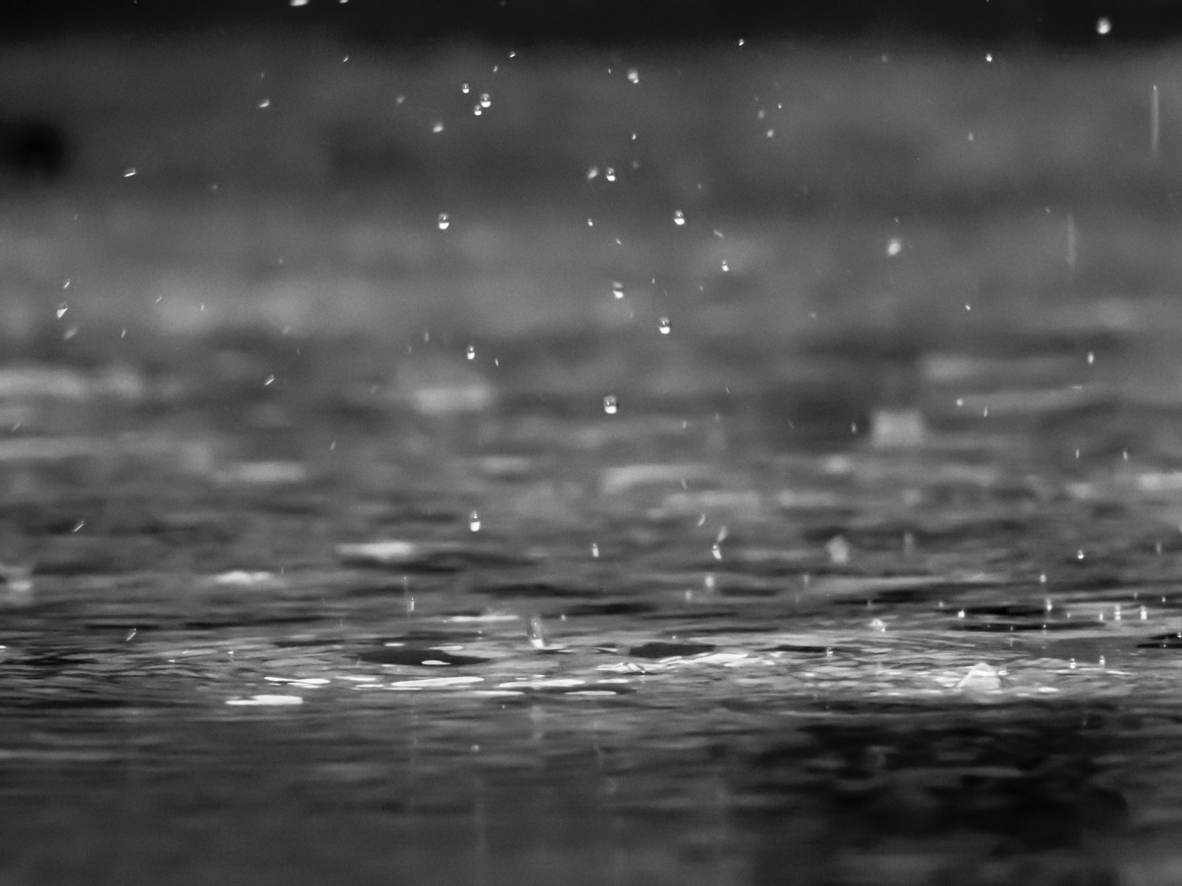 raindrops in the shape of a sphere or hamburger